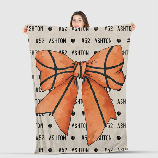 gilr holding coquette blanket basketball blanket with custom name and basketball number