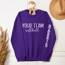 Load image into Gallery viewer, Custom Softball Sweatshirt with Team Name and Custom Name Sleeve shown in purple
