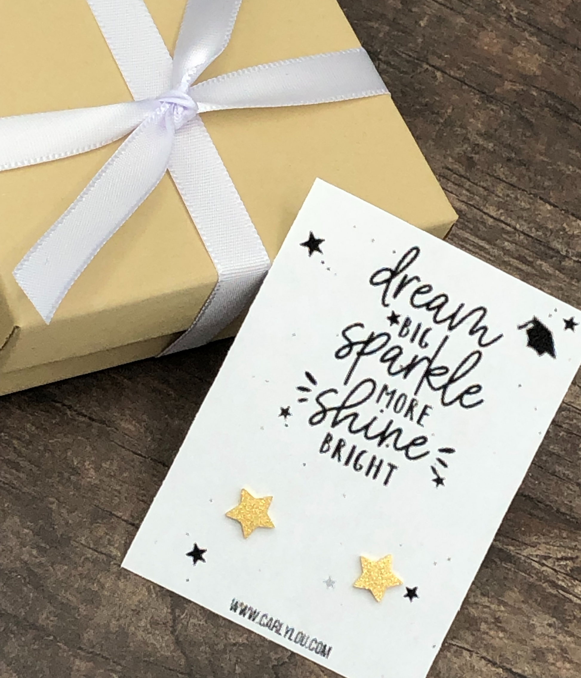 Dream Big Sparkle More Shine Bright Graduation Earrings Closeup Gold