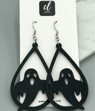 Load image into Gallery viewer, black ghost wooden dangle earrings on card
